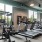 fitness center with large open spaces allowing room for workouts and for using equipment