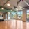 fitness center with large open spaces allowing room for workouts and for using equipment
