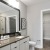 bathroom with tub and easy access to closet 